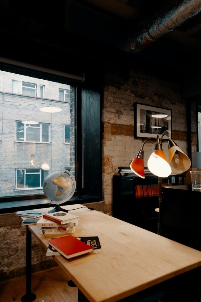 navigating desk globe on table near the window